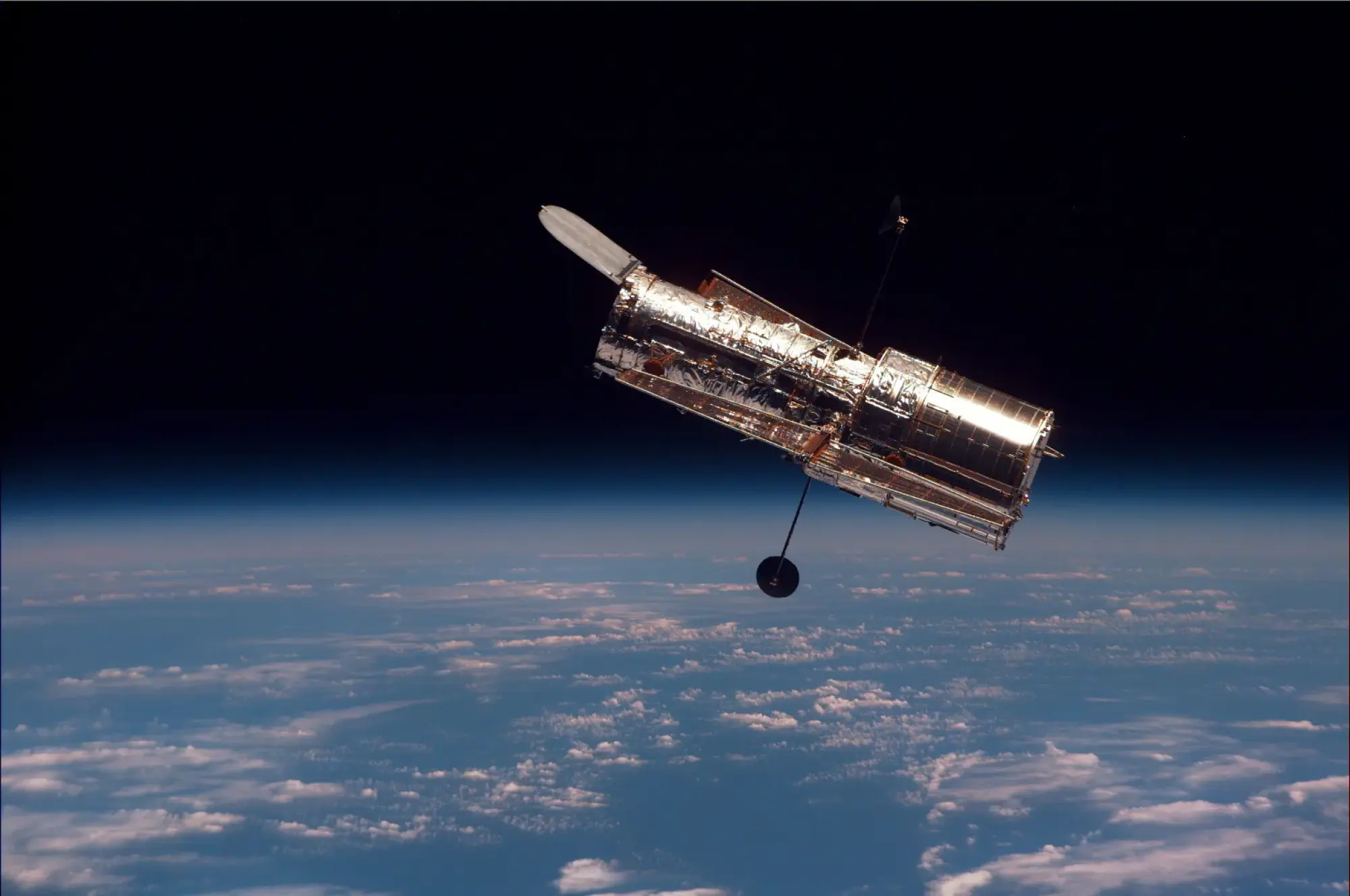 Hubble Space Telescope orbiting Earth in space