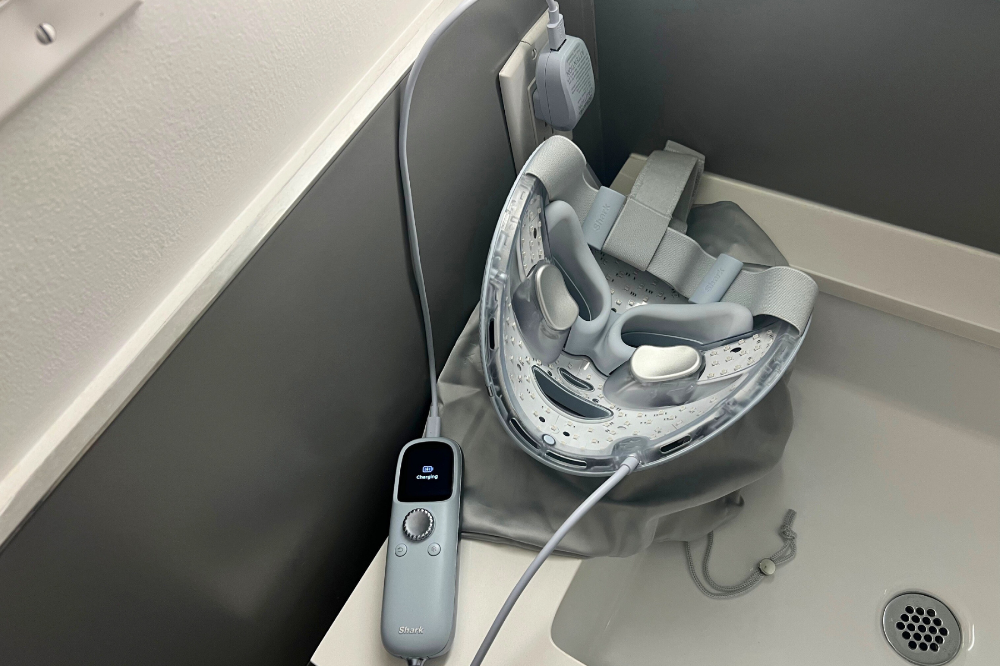 Shark CryoGlo face mask charging on bathroom counter