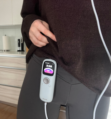 Shark CryoGlow remote clipped onto pants