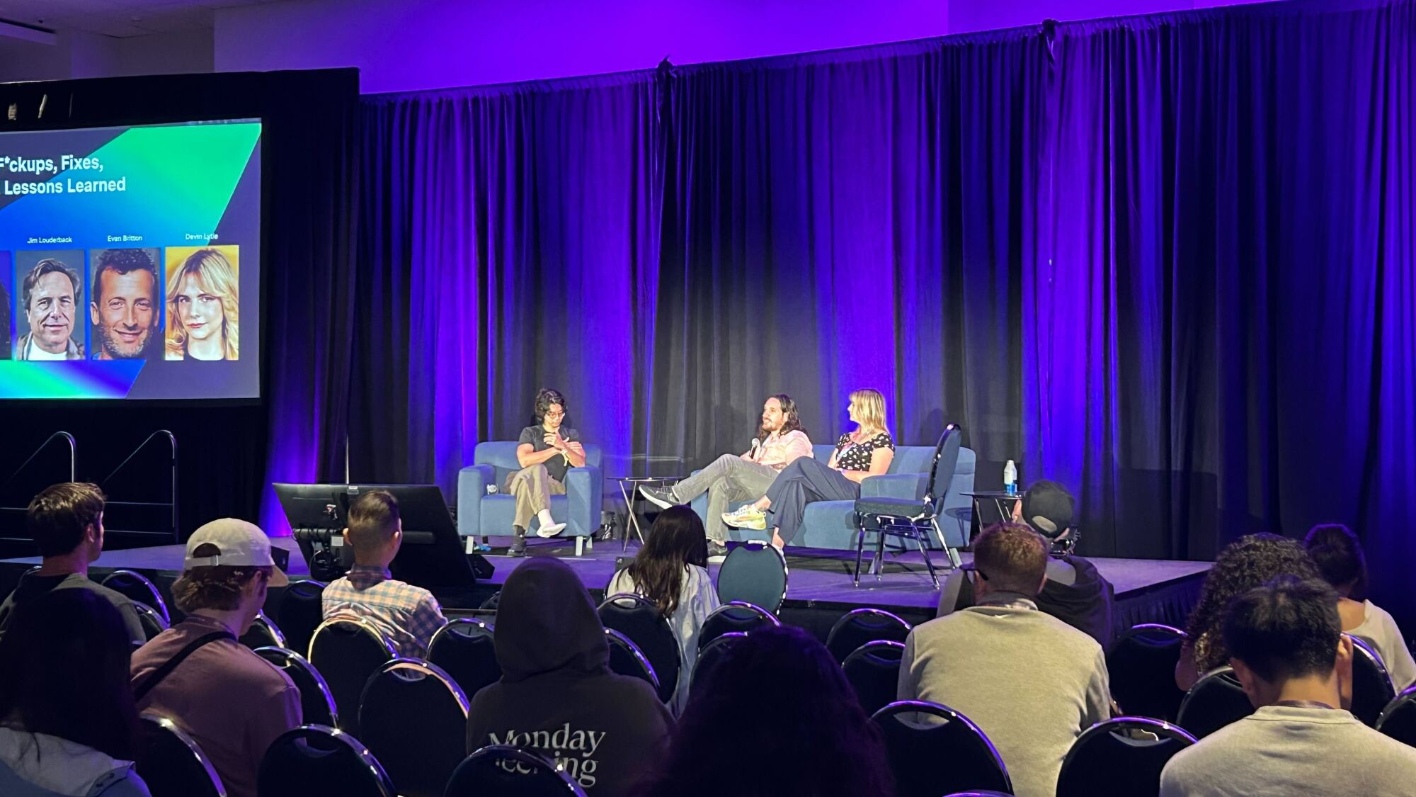 eric wei, sidney raskind, and devin lytle on stage at a vidcon panel