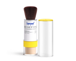 supergoop! tube of powder mineral sunscreen with brush on one end