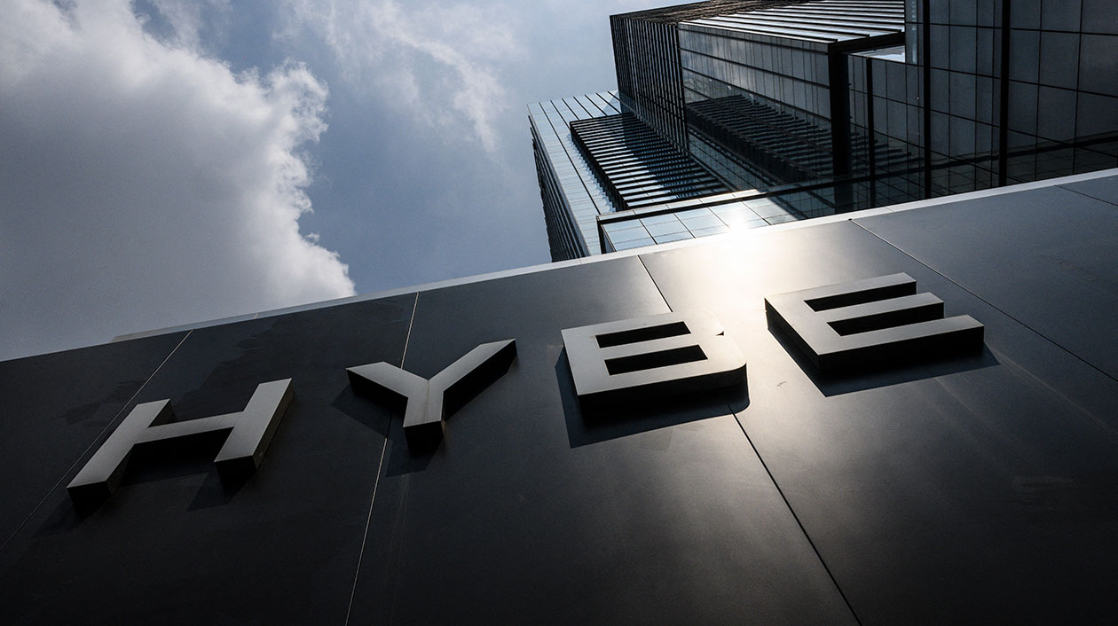 The signage for HYBE is displayed outside the company's headquarters on August 13, 2024 in Seoul, South Korea.