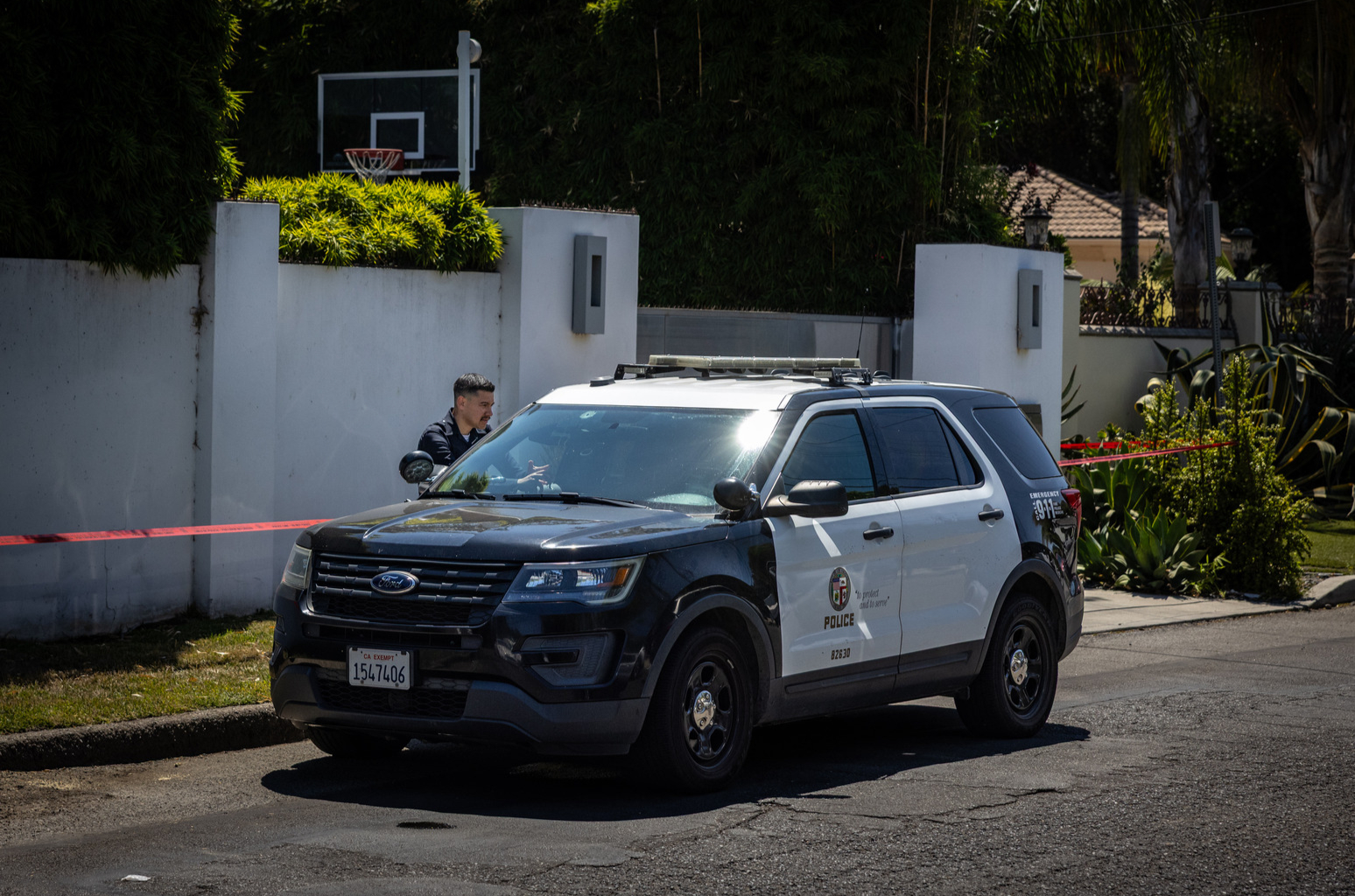 Los Angeles Police Department officials secure the home where Robin Kaye an "American Idol" music supervisor and her husband Thomas Deluca were found killed with gunshot wounds to the head on Tuesday, July 15, 2025 in Encino, CA.
