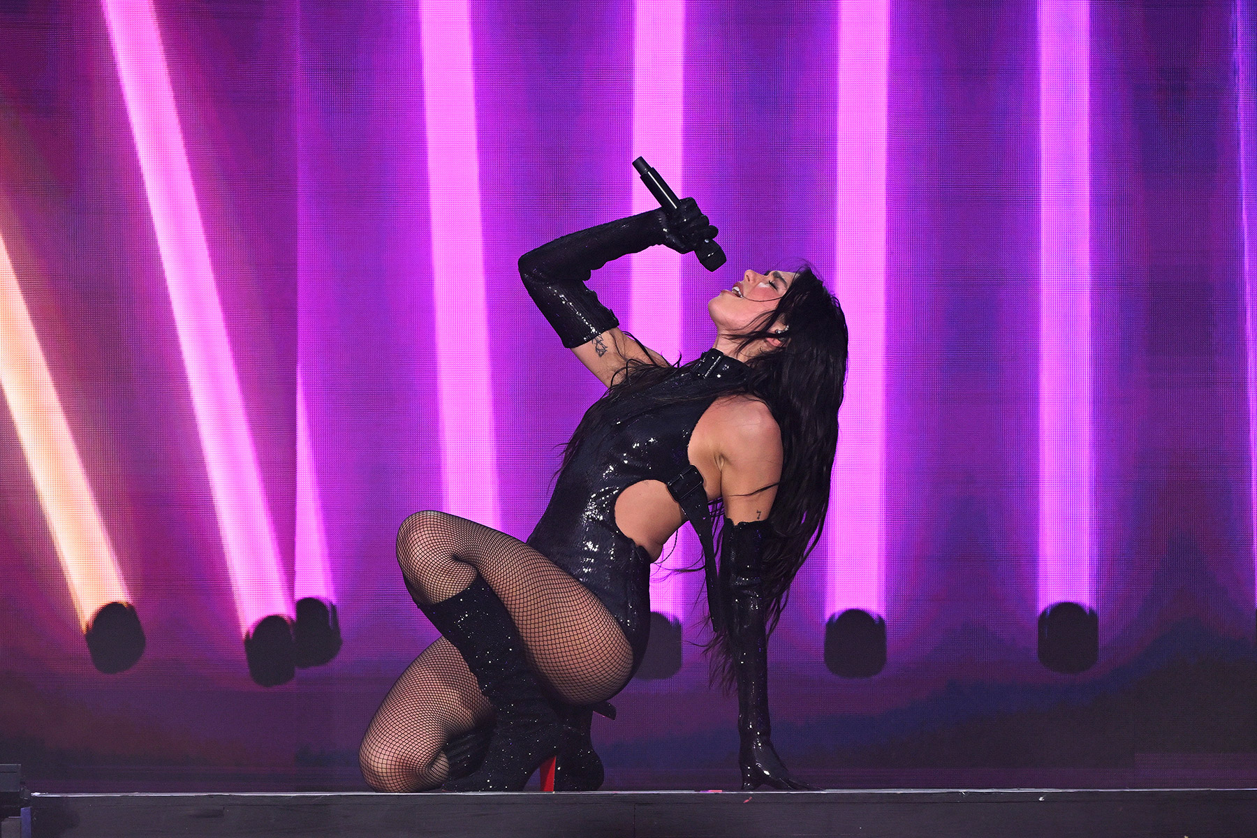 Dua Lipa performs onstage during her Radical Optimism tour at Anfield on June 25, 2025 in Liverpool, England.
