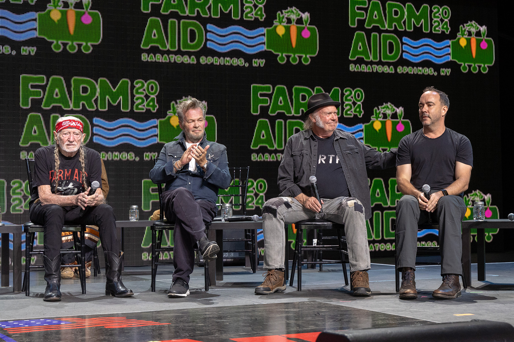 (L - R) Willie Nelson, John Mellencamp, Neil Young and Dave Matthews on stage during Farm Aid 2024 at Saratoga Performing Arts Center on September 21, 2024 in Saratoga Springs, New York.