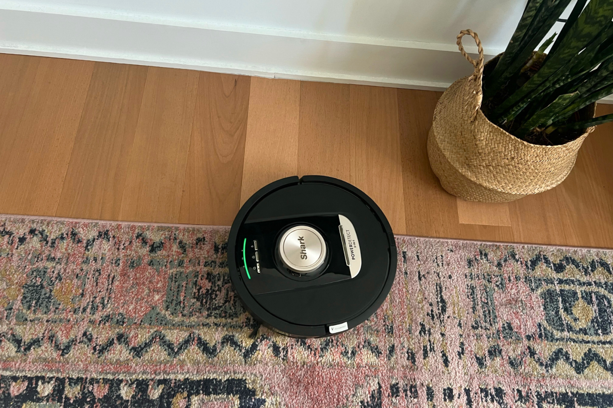 Shark robot vacuum cleaning rug and hardwood floor