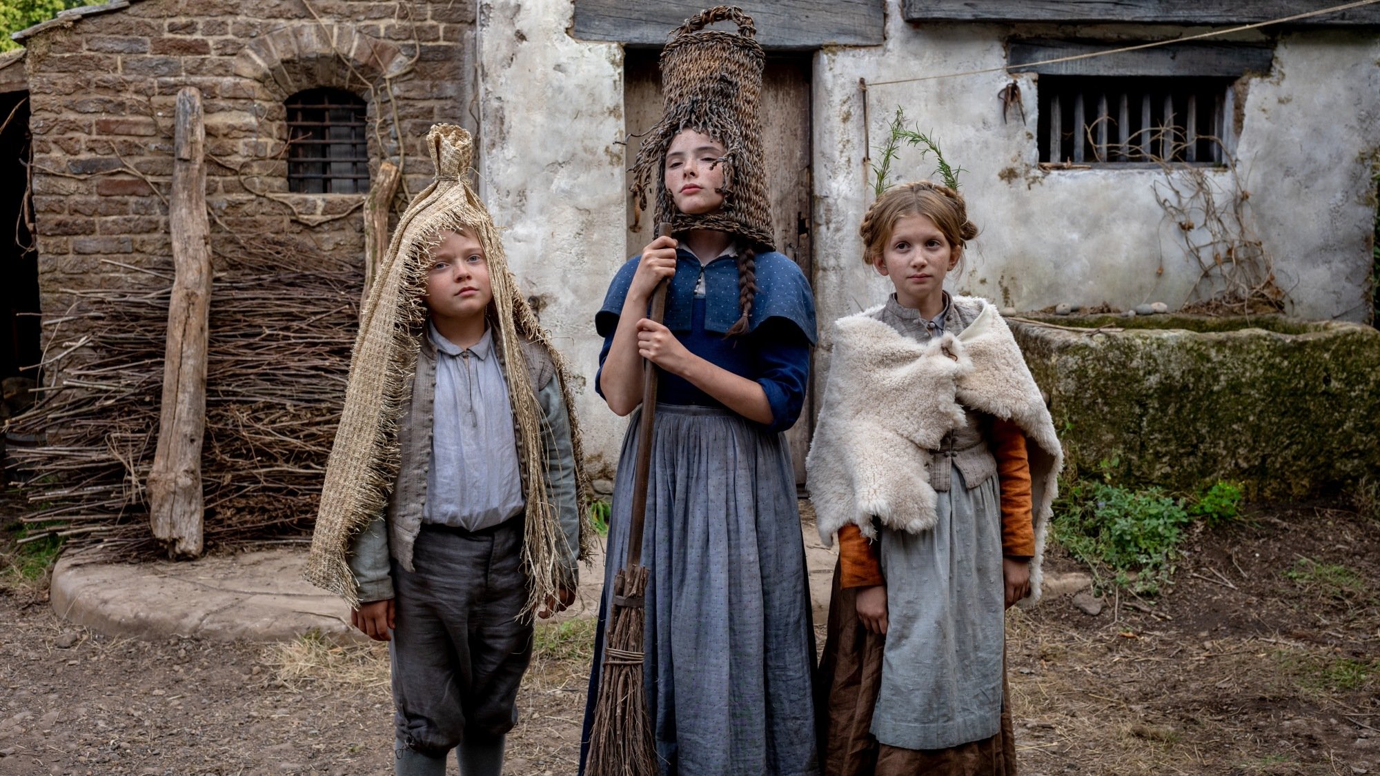 Jacobi Jupe stars as Hamnet, Bodhi Rae Breathnach as Susanna and Olivia Lynes as Judith in director Chloé Zhao’s "Hamnet," a Focus Features release.
