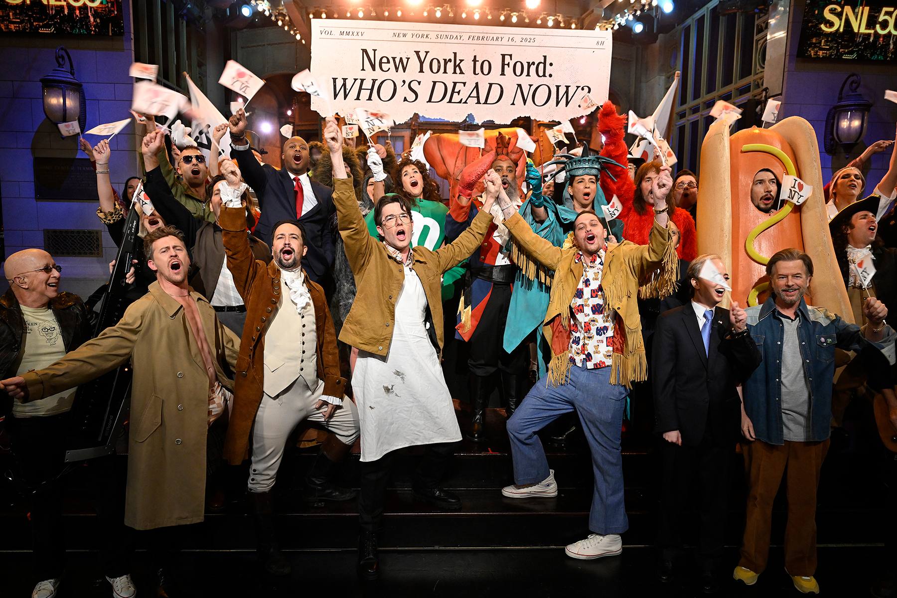 (l-r) Paul Shaffer, Scarlett Johansson, Alex Moffat, Taran Killam, Jason Segel, Lin-Manuel Miranda, Colin David Jones, Devon Walker, Ana Gasteyer, John Mulaney, Kristen Wiig, Kenan Thompson, Maya Rudolph, Pete Davidson, Will Forte, Nathan Lane, Sarah Sherman, Adam Driver, David Spade, Kyle Mooney and Cecily Strong during the "New York 50th Musical" sketch on Saturday Night Live on February 16, 2025.