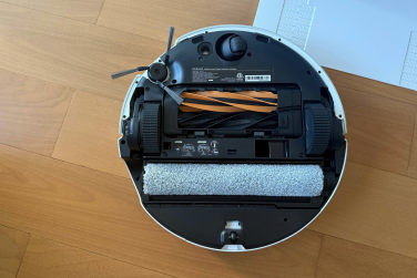 Dreame Aqua10 Ultra Roller robot vacuum flipped over to show rollers